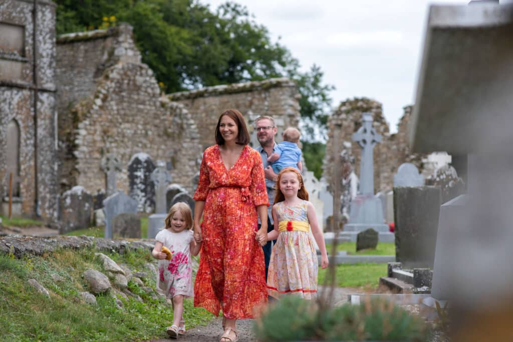 Family visiting 6th century ecclesiastical site of St. Mullins, Co. Carlow