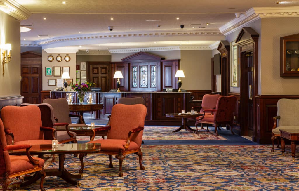 Lobby area with comfortable chairs in the distance