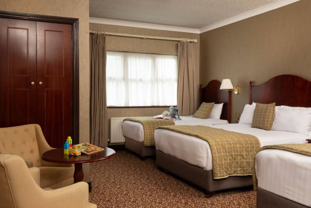 View of family bedroom with toys on desk