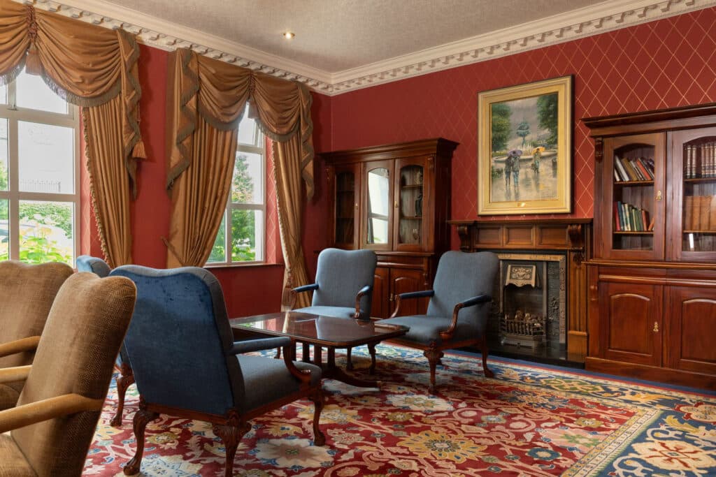 View of the lobby at the corner with chairs and desks