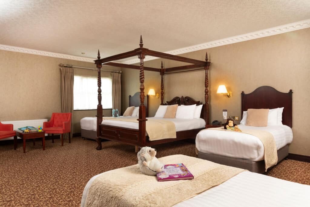 Wide shot view of family bedroom at The Seven Oaks Hotel and Leisure Club